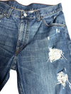 Vintage Levi's 507 Big E Distressed & Ripped Blue Medium Wash Denim Jeans | 31 Inch Waist