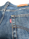 Vintage Levi's 507 Big E Distressed & Ripped Blue Medium Wash Denim Jeans | 31 Inch Waist