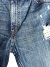 Vintage Levi's 507 Big E Distressed & Ripped Blue Medium Wash Denim Jeans | 31 Inch Waist
